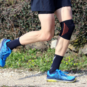 Runner with knee brace